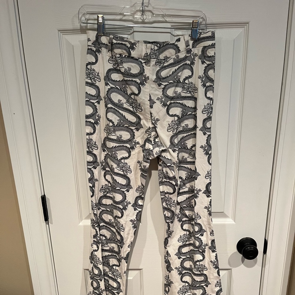 White and blue/gray dragon design jeans
